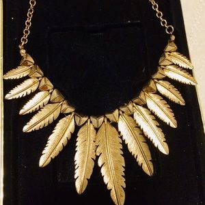 Gold feather statement necklace